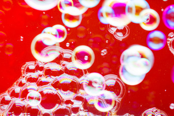 Abstract soap bubble background. Element for designers. Foam red bubble texture. Colorful bubbles float in the air