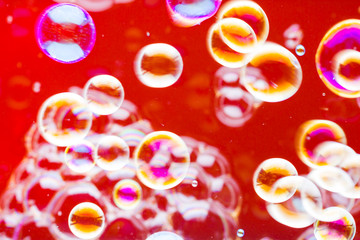 Abstract soap bubble background. Element for designers. Foam red bubble texture. Colorful bubbles float in the air