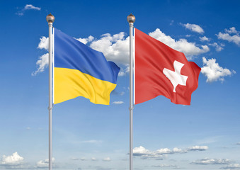 Ukraine vs Switzerland. Thick colored silky flags of Ukraine and Switzerland. 3D illustration on sky background. – Illustration