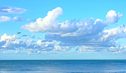 Cloudy blue sky over the sea, summer 