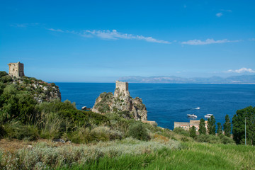 Fototapeta na wymiar Coastline with rocks and deep blue sea near Castellamare del Golfo by entrance to natural reserve Zingaro, Sicily, Italy