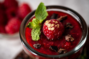 Dark Chocolate Mousse Pudding with Raspberries.
