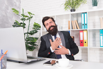 Motivational music. Accountant insurance agent relaxing with favorite music. Productivity concept....