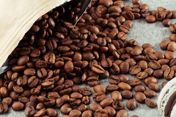 Isolated coffee bean. closeup photo. Top view. Roasted coffee beans background