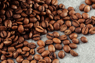 Isolated coffee bean. closeup photo. Top view. Roasted coffee beans background