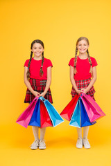 Thanks for your purchase. girls shopping. happy children with shopping bags. successful shopping. big sales. school girls with packages. purchase. black friday. holiday presents. Sale and discount