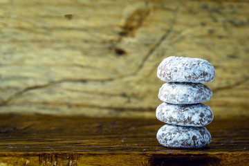 Honey bread, typical Brazilian honey biscuit with sugar and chocolate. Brazilian honey cake with chocolate - honey bread on wooden background. Selective focus. Copy space