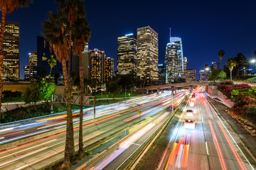 Fototapeta na wymiar Downtown Los Angeles at sunset with car traffic light trails