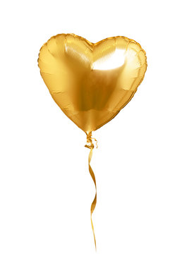 Golden heart shaped air balloon. Isolated on white background