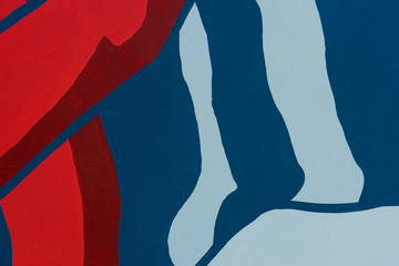 Bright detal of wall is decorated with abstract paint closeup. Fragment for background. Modern urban culture