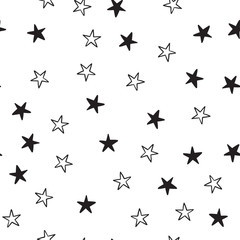 Star doodles seamless pattern. Hand drawn stars texture background.