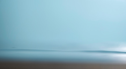 Blurred beach with bokeh sunlight wave abstract background. Vintage tone