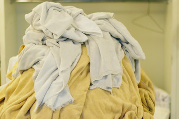 laundry room with full of soiled bath towels