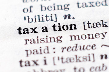 Obraz premium Definition of word Taxation