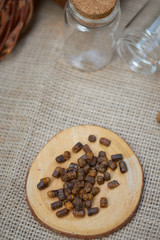 ambrosia on a wooden board on a wicker table and glass jar