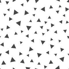 Triangles seamless pattern. Randomly distributed triangle texture background.