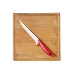 Sharp boning knife with wooden board isolated on white, top view
