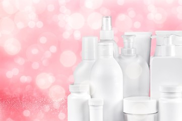 Cosmetic containers isolated on background