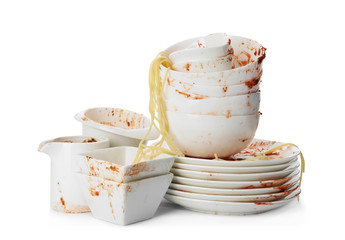 Set of dirty dishes with spaghetti leftovers isolated on white - obrazy, fototapety, plakaty