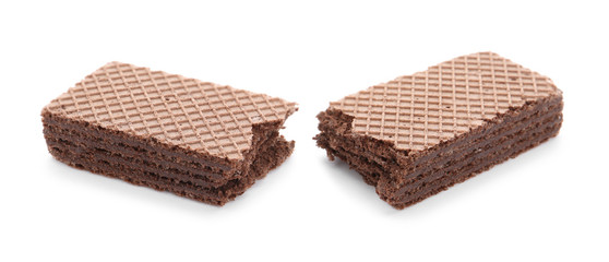 Delicious broken crispy wafer on white background. Sweet food