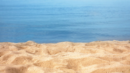 View of sea water and beach sand on sunny summer day © New Africa