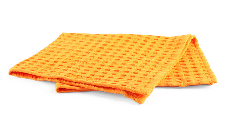 Folded orange kitchen towel on white background
