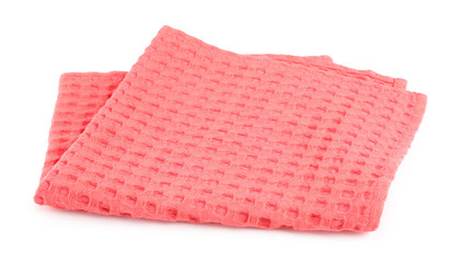 Folded coral kitchen towel on white background