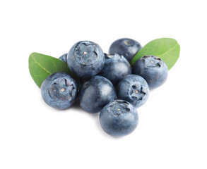 Fresh raw tasty blueberries with leaves isolated on white