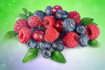 Fresh ripe berries on white background