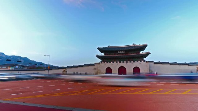 Time lapse shot of traffic in front of Gyeongbokgung palace, at a evening, in Seoul, South Korea