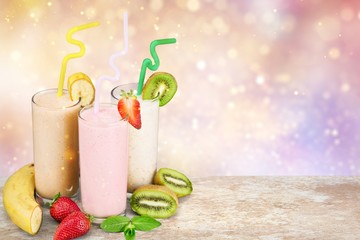 Fruit Smoothies with Straws  Isolated on a White Background