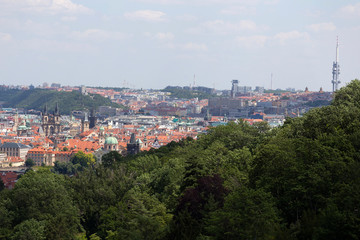 Fototapeta na wymiar Summer Prague City with St. Nicholas' Cathedral from the Hill Petrin, Czech Republic