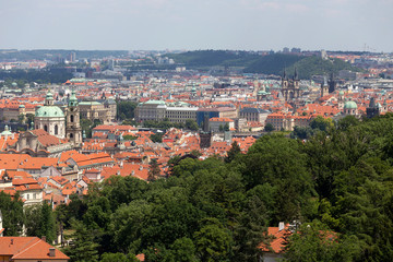Fototapeta na wymiar Summer Prague City with St. Nicholas' Cathedral from the Hill Petrin, Czech Republic