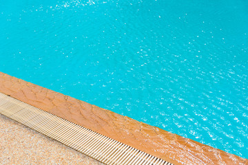 Beautiful pool side for relaxation in summer, ripple water in swimming pool