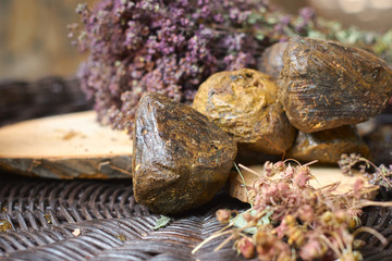 propolis with medicinal herbs oregano, chamomile and strawberry flowers