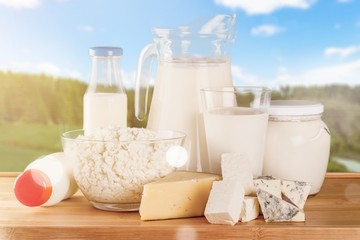 Glass of milk  and Dairy products on  background