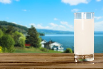Glass of milk  for breakfast on  background