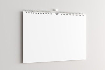 Blank calendar mock up on the wall.