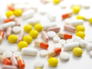 Pills on white background