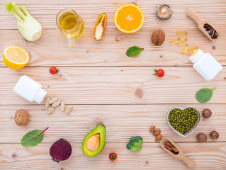 Ingredients for the healthy foods selection. The concept of healthy food set up on wooden background.