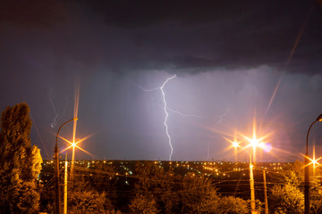 lightnings and thunder bolt strike at summer storm