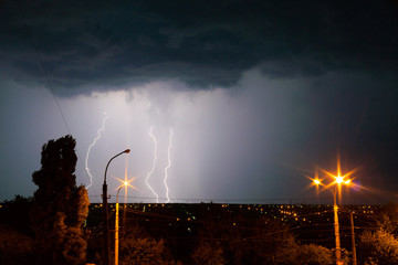 lightnings and thunder bolt strike at summer storm
