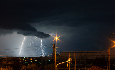 lightnings and thunder bolt strike at summer storm
