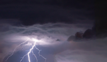 lightnings and thunder bolt strike at summer storm