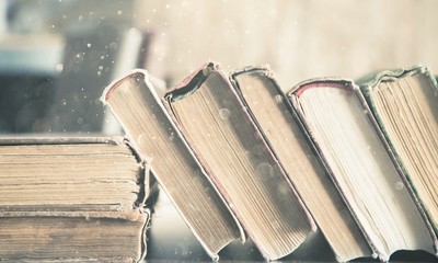 Close up of Rows of old books on the table