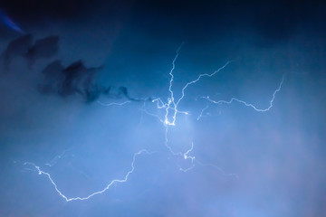 lightnings and thunder bolt strike at summer storm