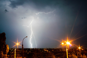 lightnings and thunder bolt strike at summer storm