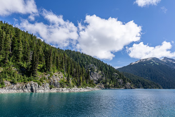 Fototapeta na wymiar view at Garibaldi lake beautiful sunny morning with clouds on bluew sky.