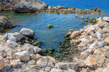 lagoon with big stones, coastal scenery 