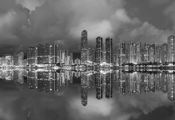 Panorama of skyline and Harbor of midtown of Hong Kong city at dusk